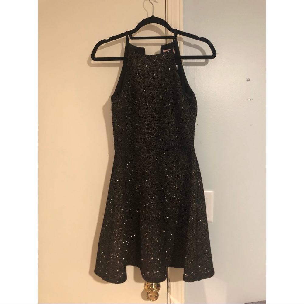 Black and gold glitter cocktail dress